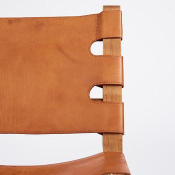 Børge Mogensen, an oak and natural brown leather easy chair model "2224", Fredericia Stolefabrik, Denmark, 1960s.