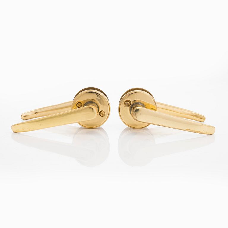 A set of 8 + 2 mid and late 20th century door handles.