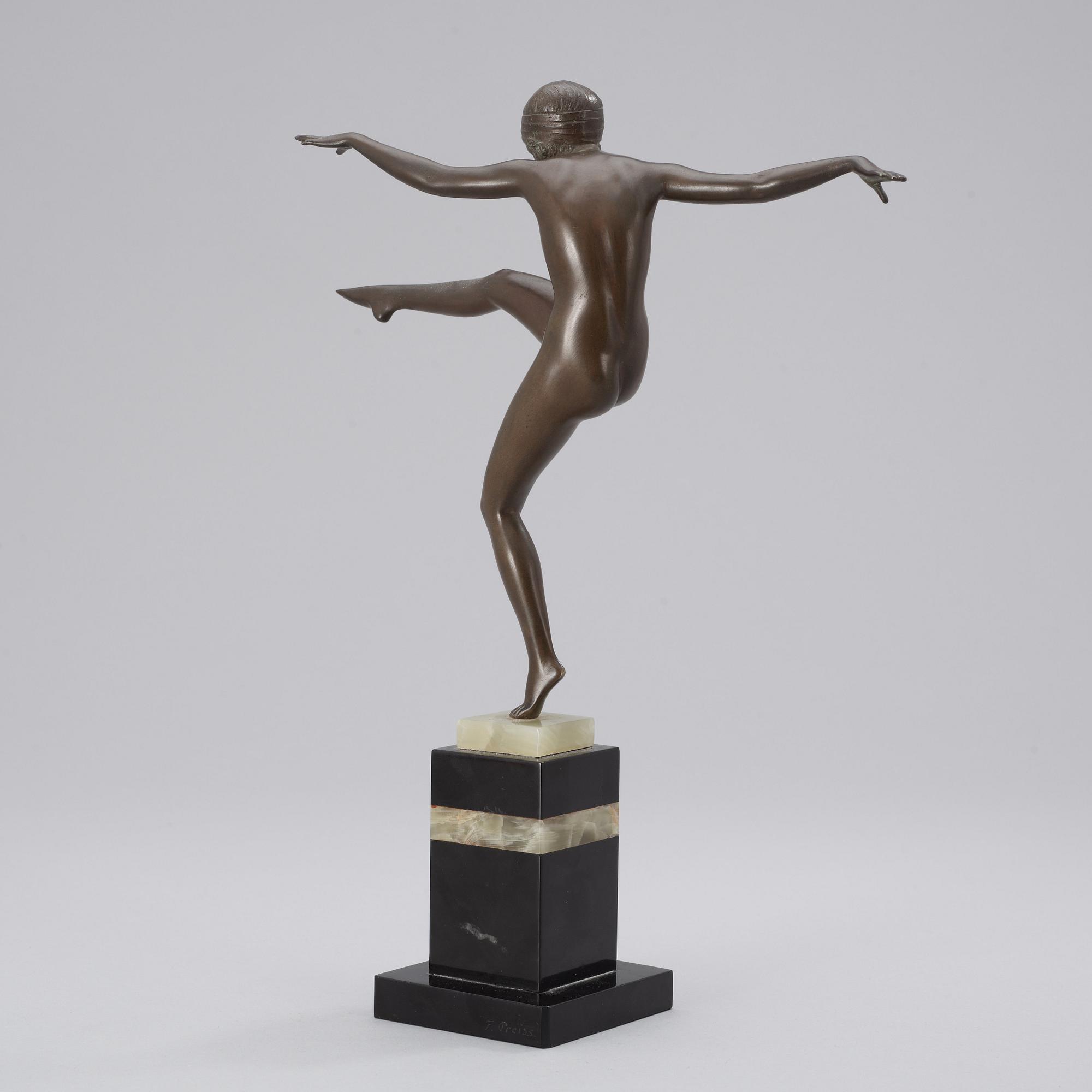A Ferdinand Preiss Art Deco patinated bronze figure.