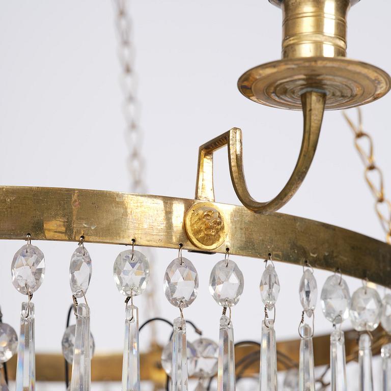 A late Gustavian five-light gilt brass and cut glass chandelier, Stockholm, late 18th century.