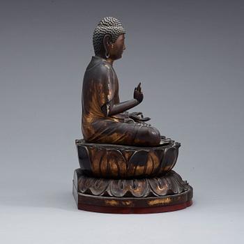 A Japanese wood and lacquer figure of buddha, Meiji (1868-1912).