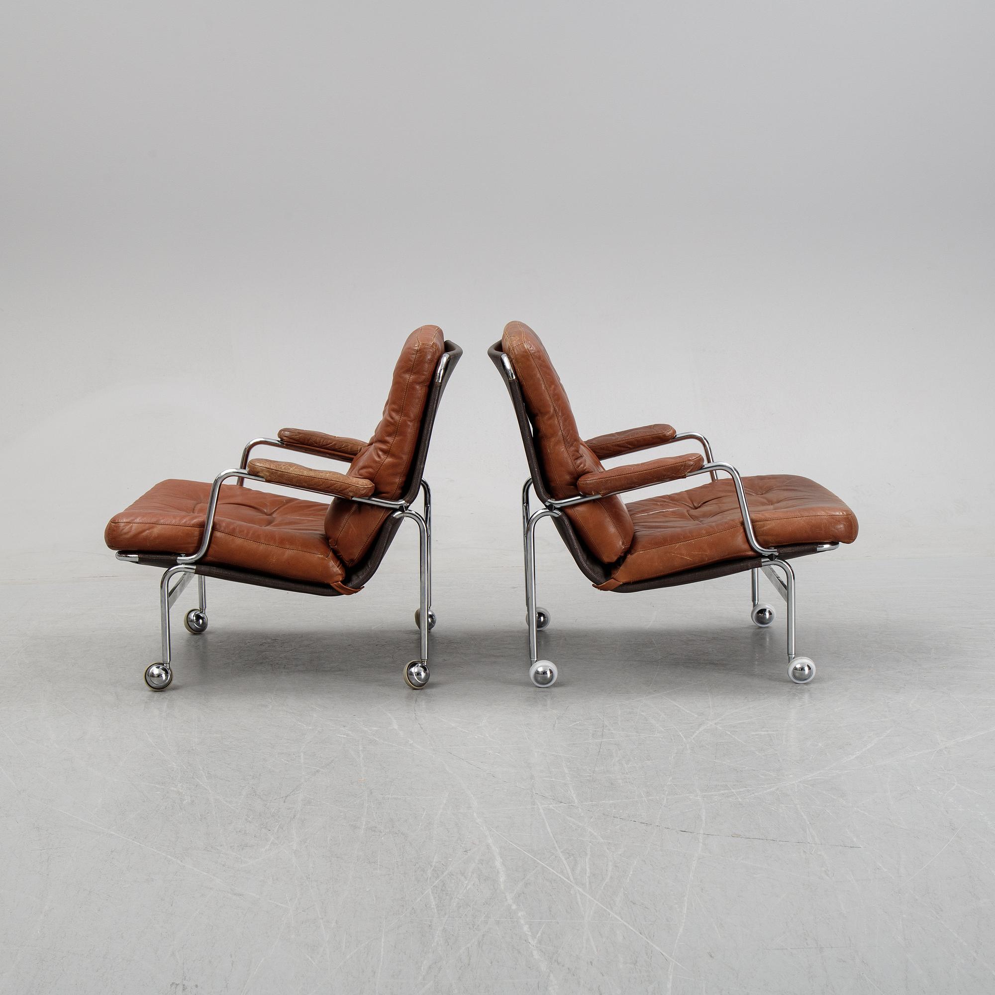 A pair of 'Karin' easy chairs by Bruno Mathsson for Dux, designed 1969.
