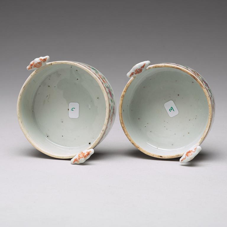 A pair of famille rose 'double peacock' condiment dishes, Qing dynasty, Qianlong (1736-95).