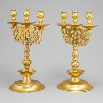 Two 19th century brass candelabra, probably Poland.