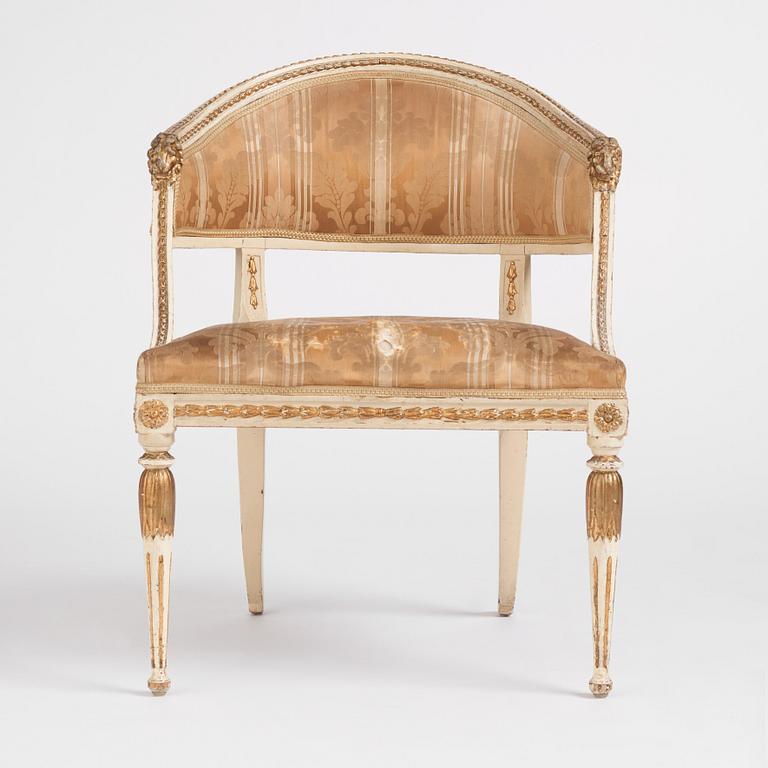 A late Gustavian carved and part-gilt open armchair, late 18th century.
