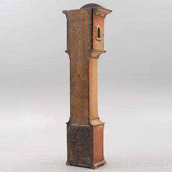 A 18th century longcase clock.