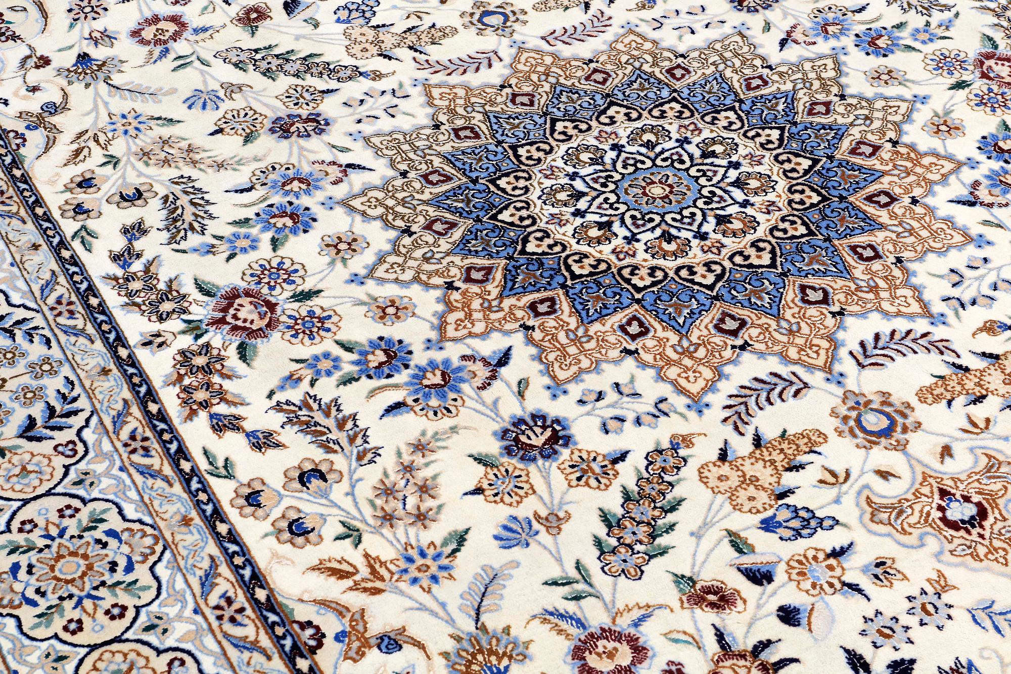 A CARPET, Nain part silk, so called 9 LAA, ca 307 x 210 cm.