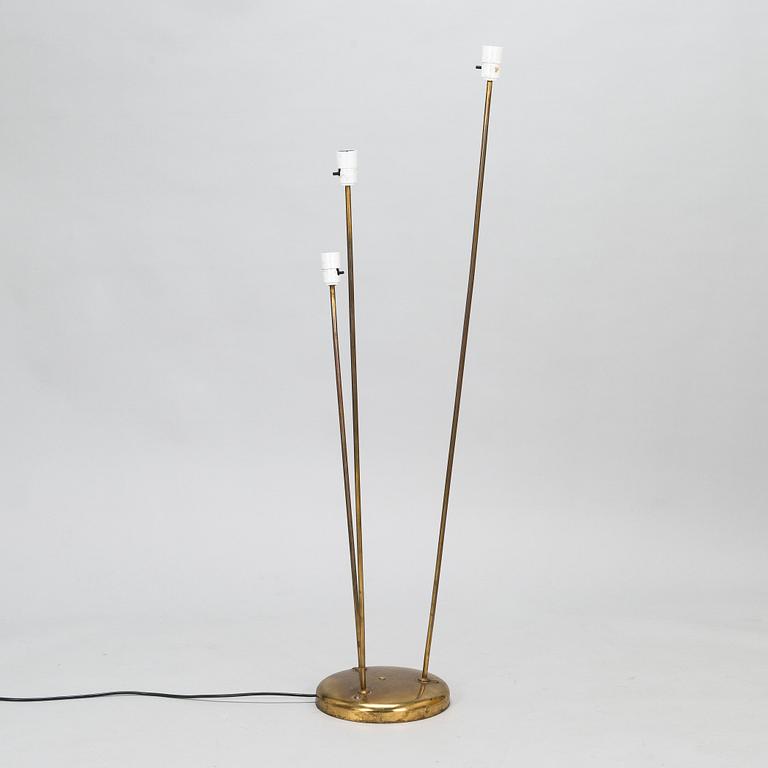 A mid-20th-century three-light floor lamp.