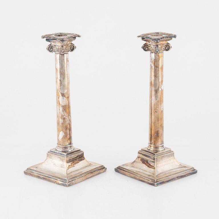 A pair of silver-plate candlesticks, early 20th century.