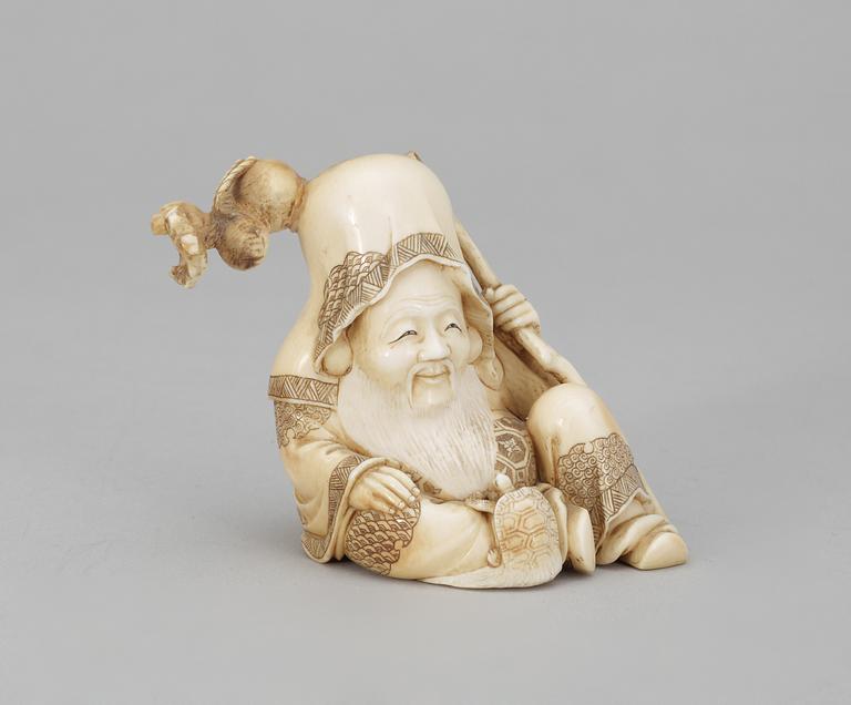 A Japanese ivory okimono figure of Sholaou, Meiji period.