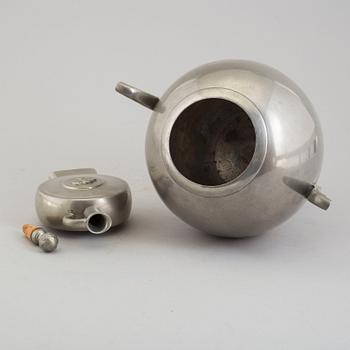 A 1930´s pewter vase and bottle.