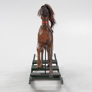 An early 20th century rocking horse.