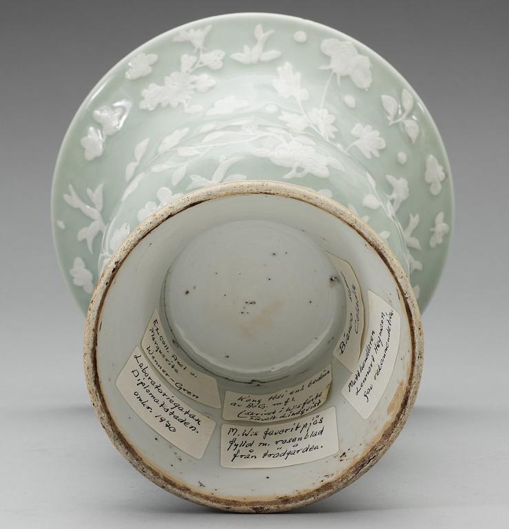 A celadon slip decorated vase, Qing dynasty, Kangxi (1662-1722).