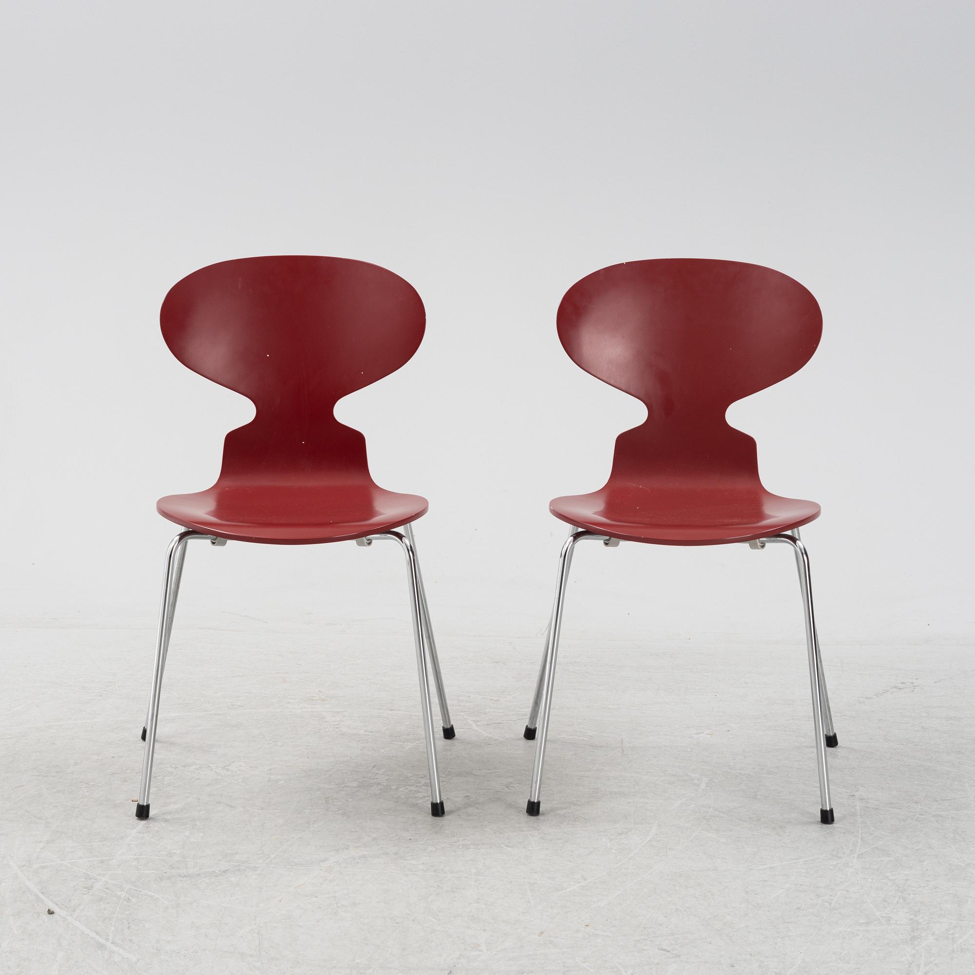 Arne Jacobsen, two 'The Ant' chairs, Frits Hansen, Denmark, 2003.