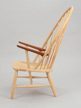 A Hans J Wegner ash and teak 'Peacock chair', by PP Møbler, Denmark.