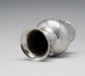 A persian silver two handled vase from the late Qajardynasty.