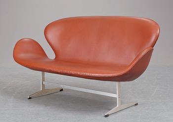 An Arne Jacobsen brown leather and aluminium "Swan" sofa, Fritz Hansen, Denmark.