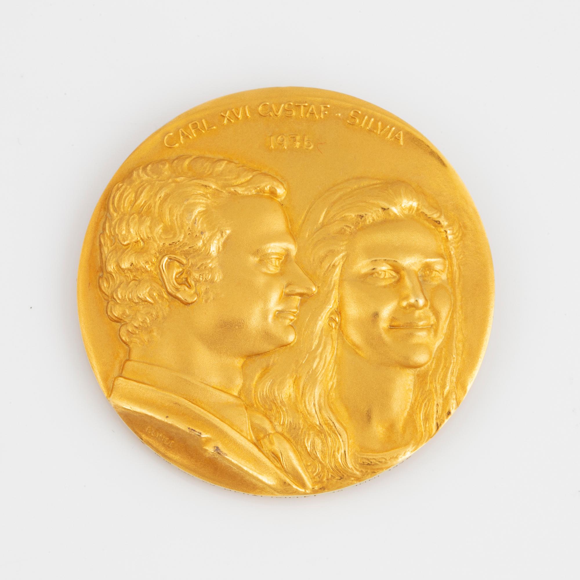 A Swedish commemorative medal in 18K gold.