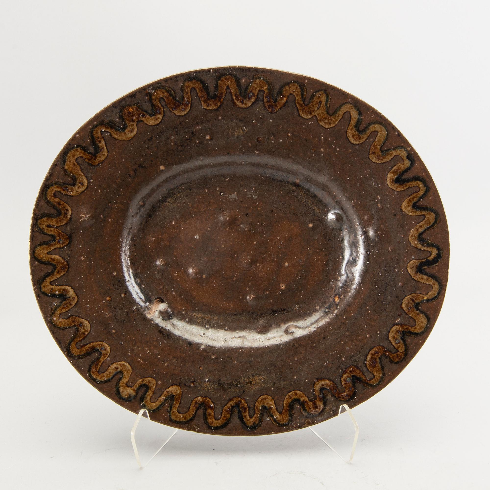 Two signed stonewear plates by Åke Holm.