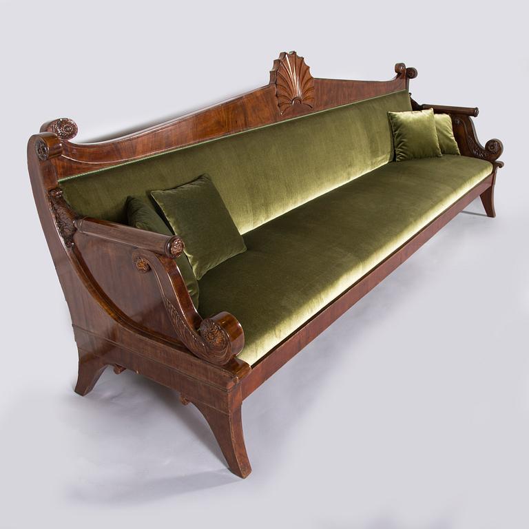 An Empire sofa, around 1820, the Reign of Alexander I (1801-25), Saint Petersburg, Russia. Length 333 cm.