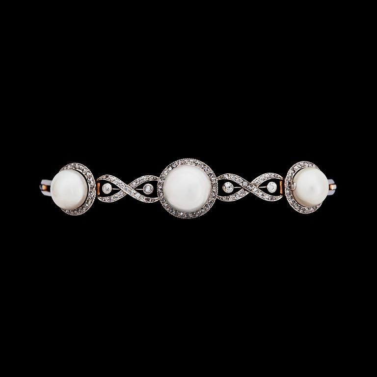 A diamond and natural bouton pearl bracelet, 1930's.