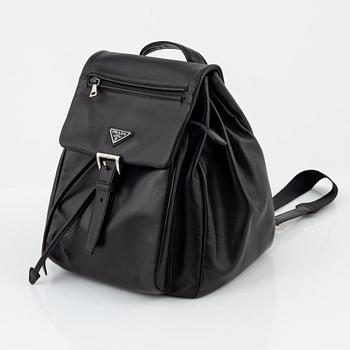 Prada, a leather backpack.
