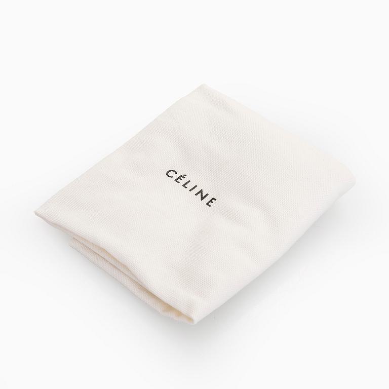 Céline, a black leather 'Trio Small' bag.