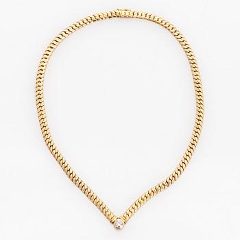Collier, 18K guld och en briljantslipad diamant.