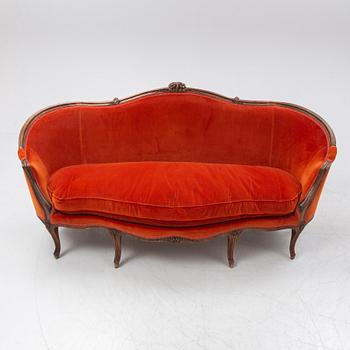 A Louis XV sofa, France, mid 18th Century.
