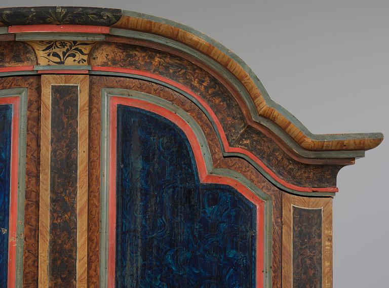 A polychrome-painted folk art cabinet from Värmland, Sweden, dated 1818.