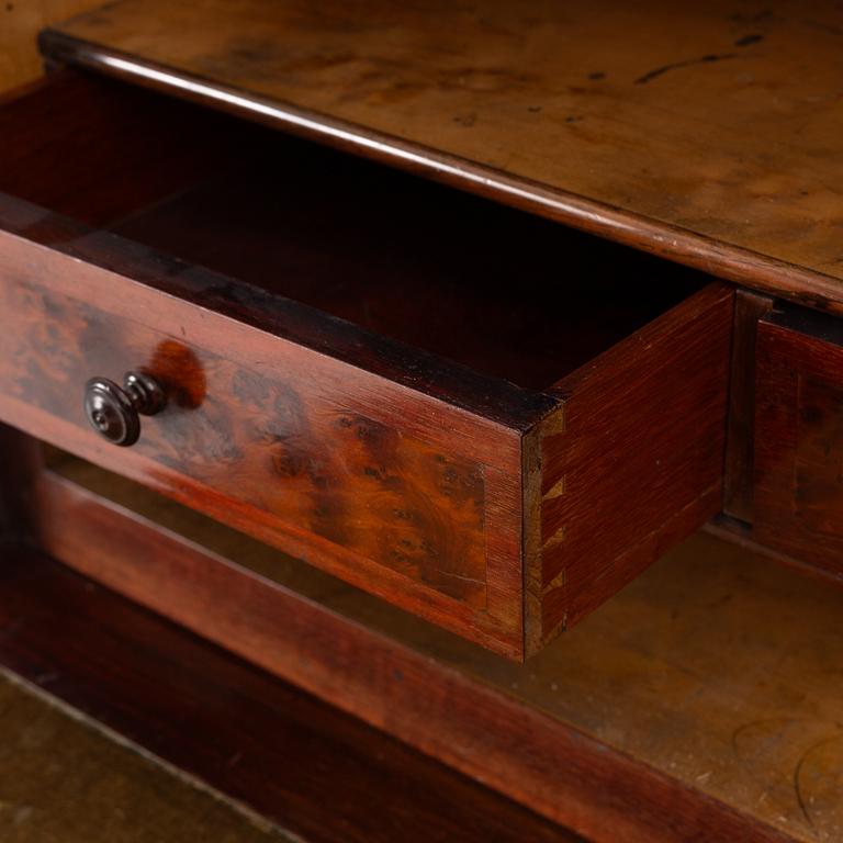 A Louis XVI-style chest of drawers, circa 1900.