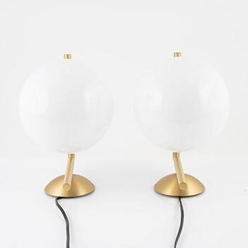 Michael Anastassiades, a pair of 'IC' brass wall lamps, Flos, Italy.