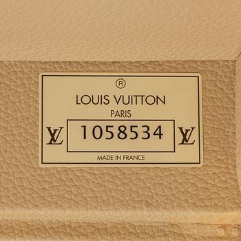Louis Vuitton, A 'Alzer 60' travel bag, 2002.