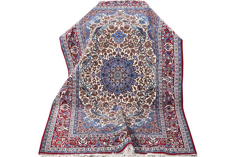 A part silk Isfahan rug, a. 243 x 158 cm.