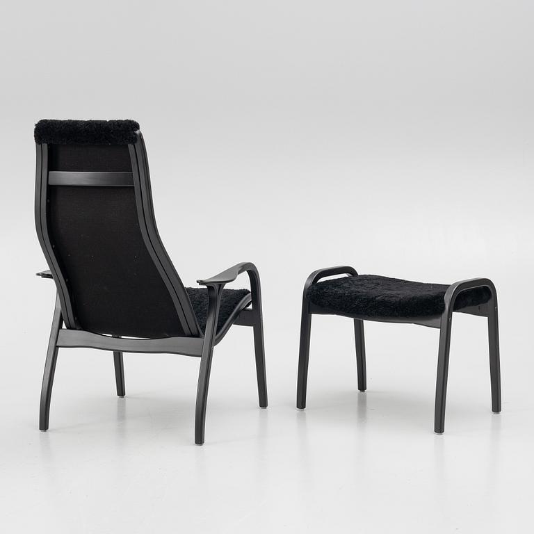 Yngve Ekström, a 'Lamino' easy chair with footstool, Swedese, 2018.
