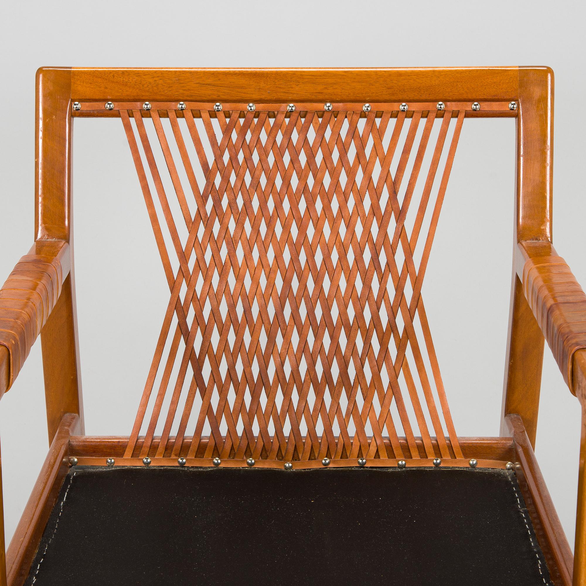 Carl Gustaf Hiort af Ornäs, a pair of late 1950s 'Rialto' open armchairs, Puunveisto Oy - Träsnideri Ab, Finland.