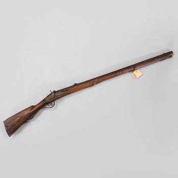 A percussion rifle marked Tula 1788.