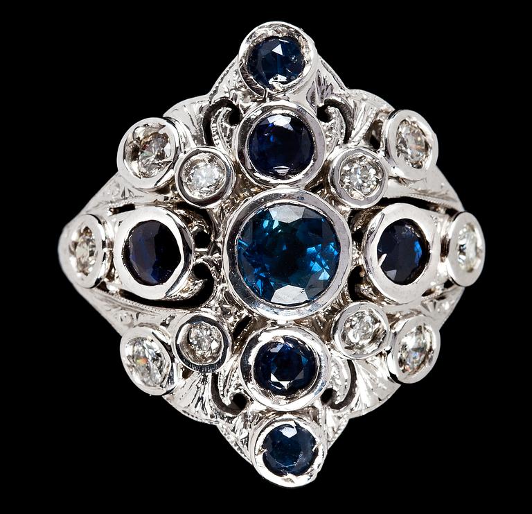 A blue sapphire and diamond ring, tot. app 0.50 cts.