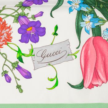 Gucci, a 'Flora' silk scarf.