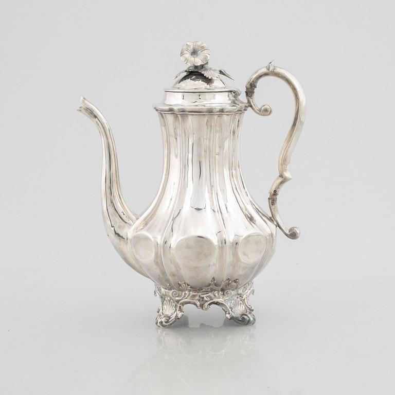 A Swedish Silver Rococo-Revival Coffee Pot, mark of Christian Hammer, Stockholm 1850.