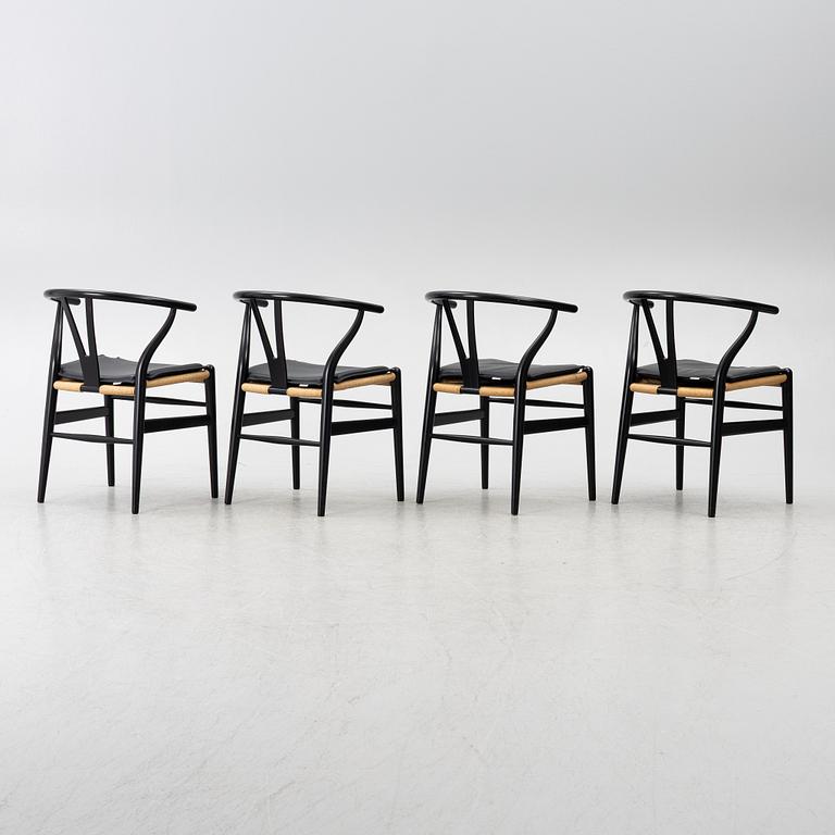 Hans J. Wegner, four CH24/ "Wishbone" chairs, Carl Hansen & Son, Denmark, 21st century.