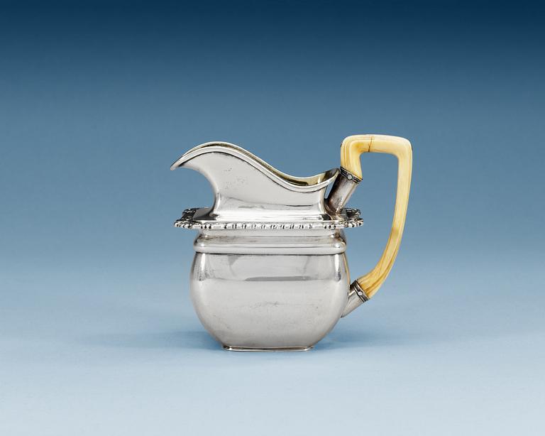 A RUSSIAN PARCEL-GILT CREAM-JUG, makers mark of Wulf, St. Petersburg 1825.