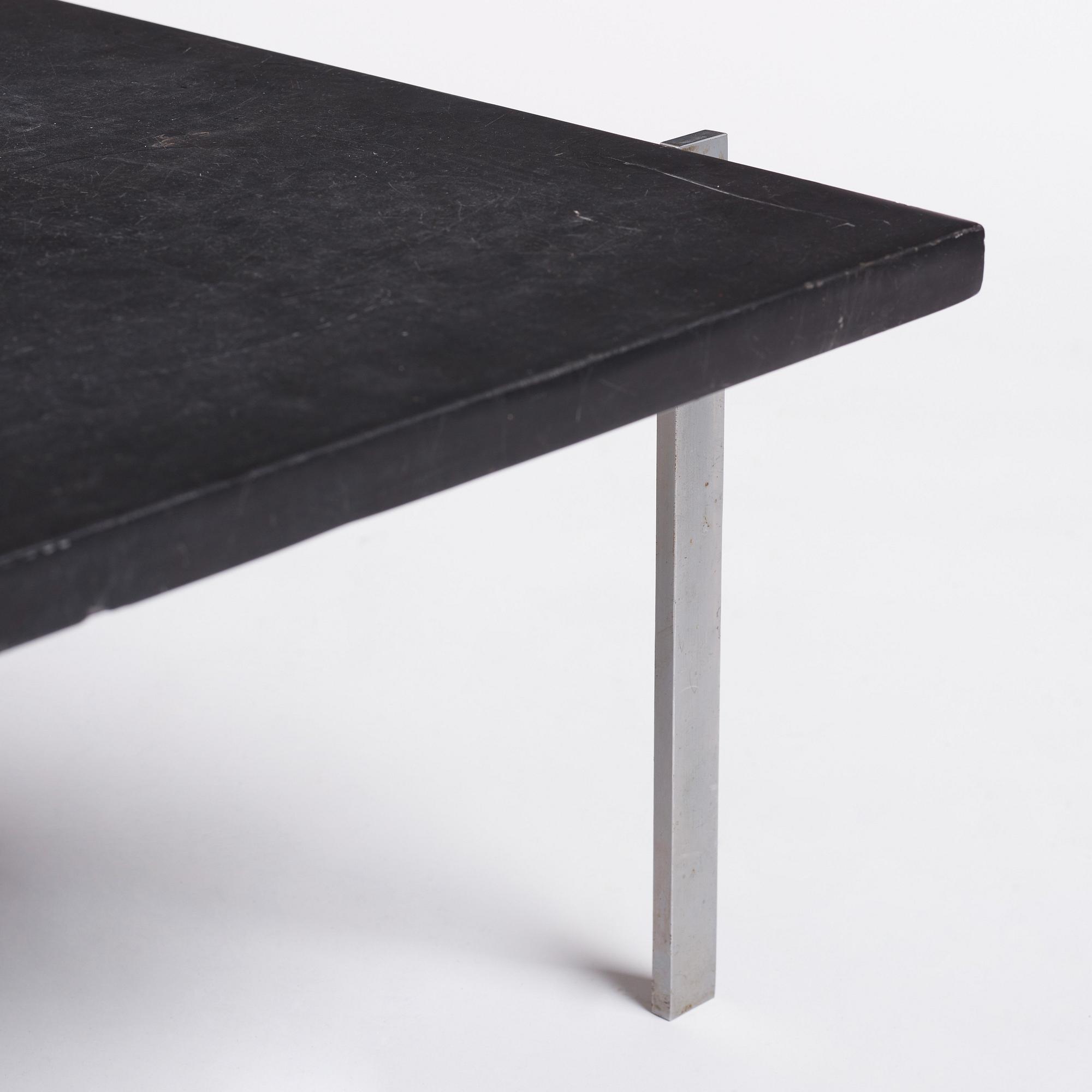 Poul Kjaerholm, a black stone top 'PK61' table, edition E Kold Christensen, Denmark.