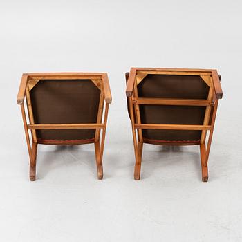 Carl Malmsten, Dining table with 2 armchairs and 6 chairs, 'Ambassador', Åfors Möbelfabrik, second half of the 20th century.
