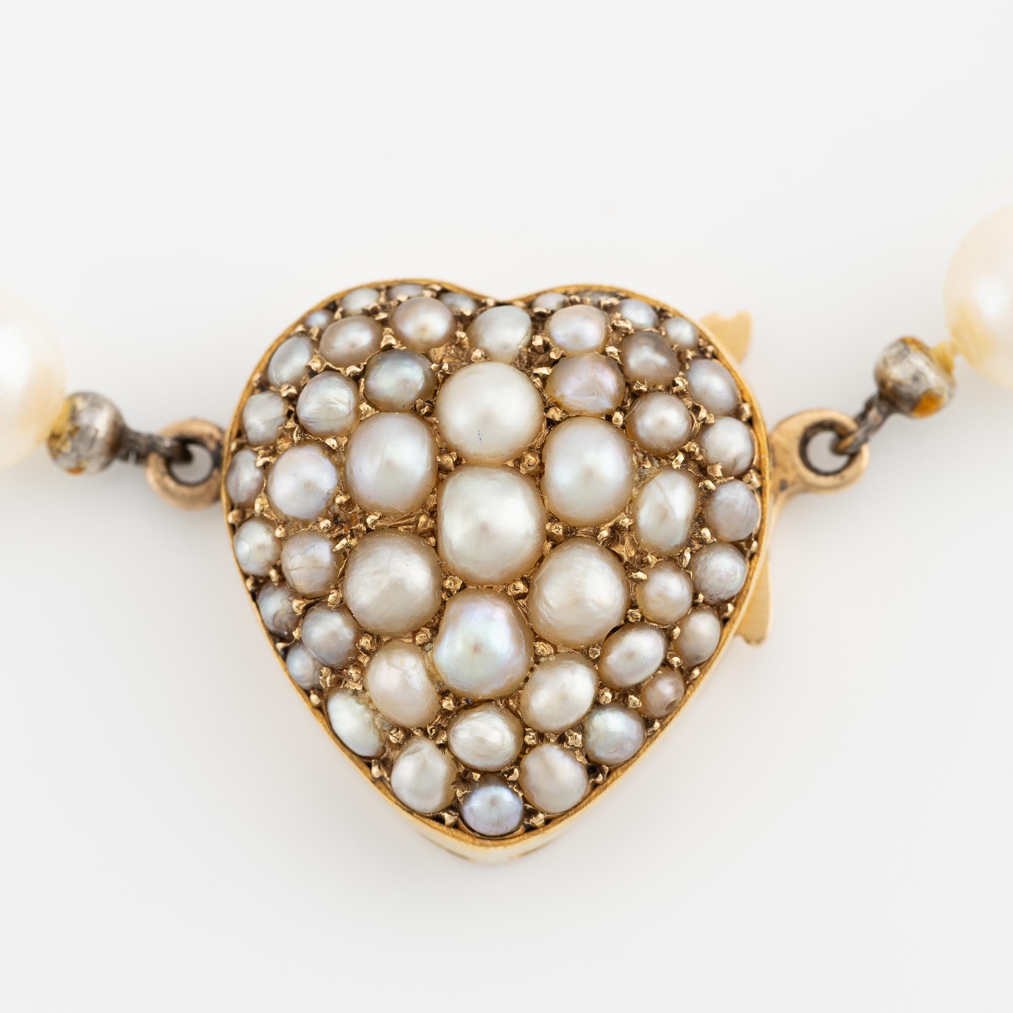 Pearl necklace, cultured pearls, clasp heart-shaped in gold with pearls.