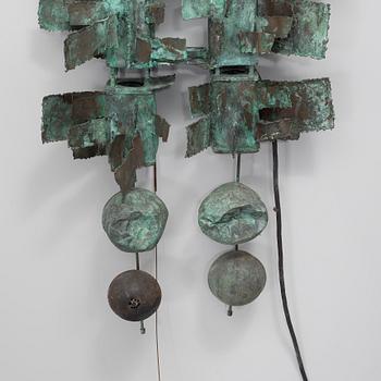 a patinated metal sculpture,
