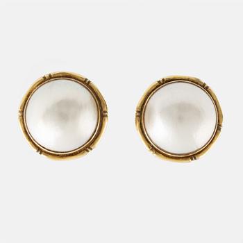 14K gold and mabe pearl clip earrings.