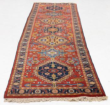 A semi-antique Kurdish runner, 350 x 140 cm.