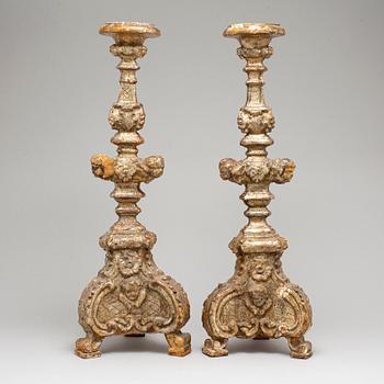 A pair of 18th century candlesticks.