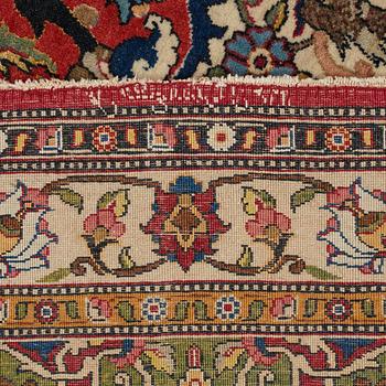 A CARPET, a semi-antique Esfahan park silk, ca 309 x 206,5 cm.